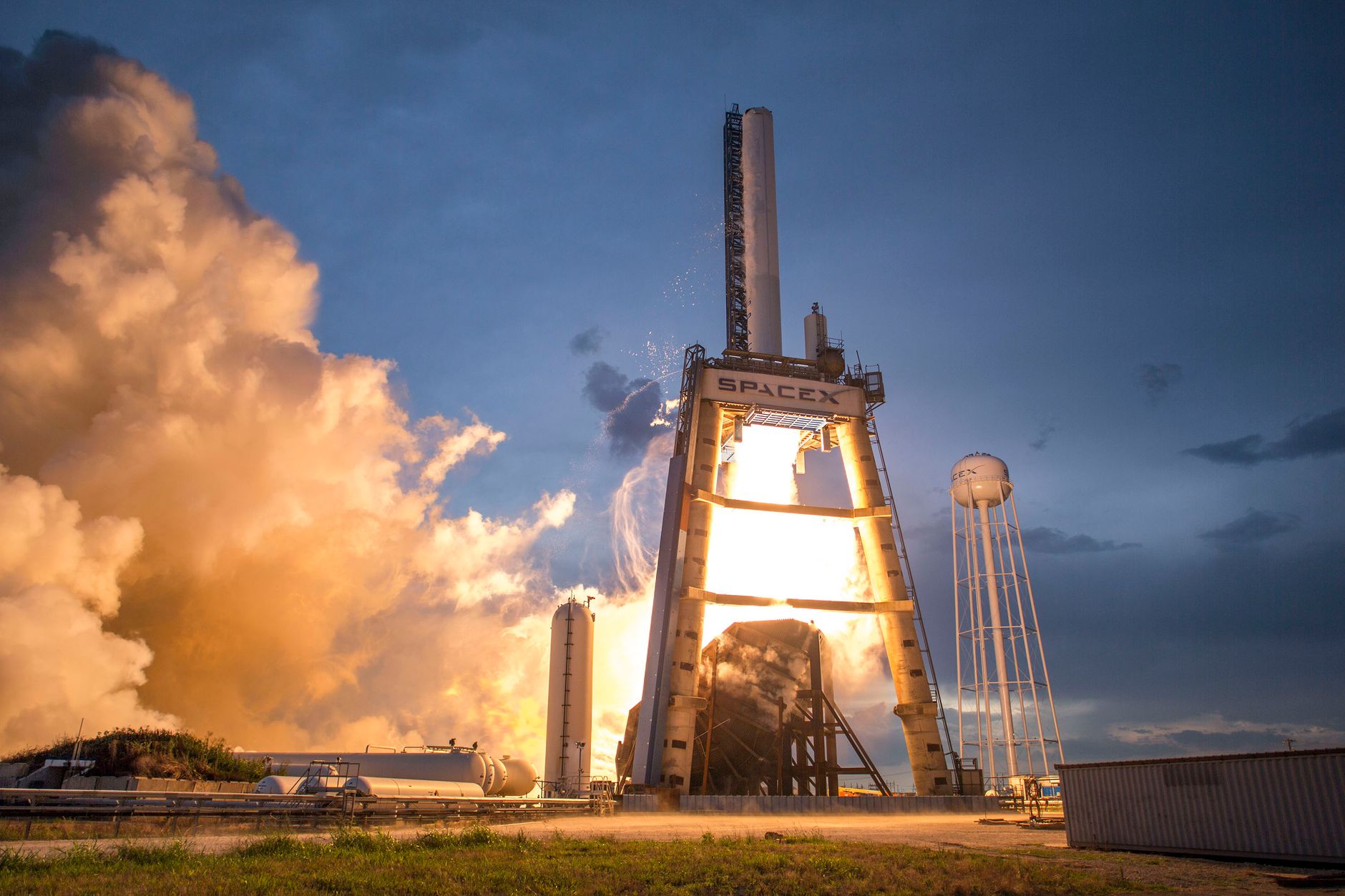 photo of gray and white spacex space shuttle