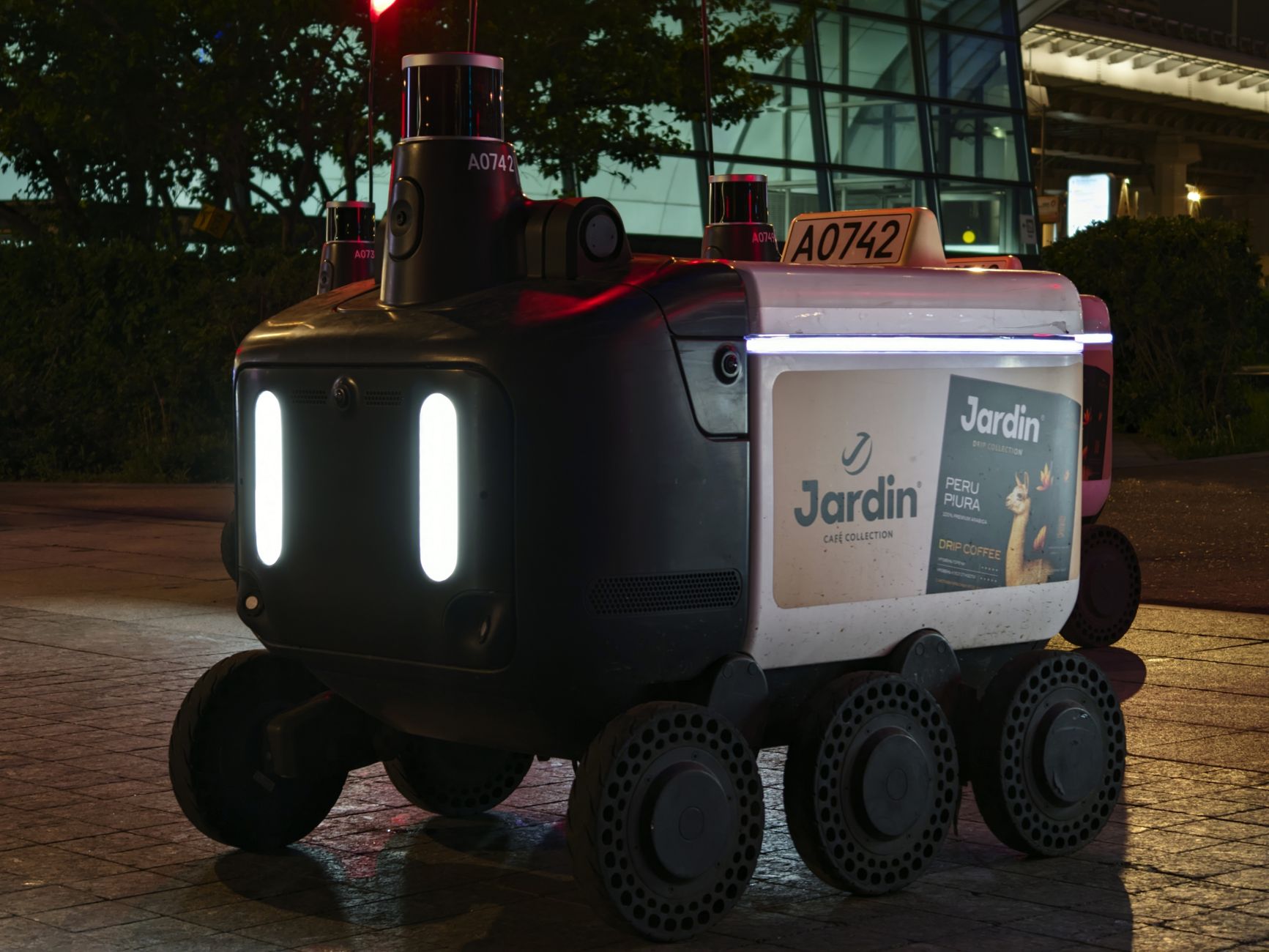 autonomous delivery robot at night